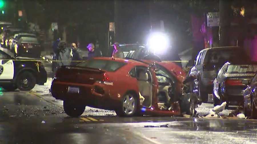 Man killed in crash with parked Oakland PD cars