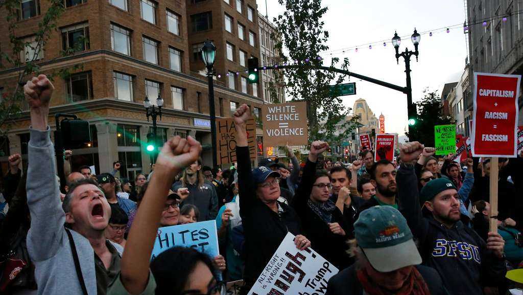 Hundreds march to denounce white nationalist violence after Virginia rally