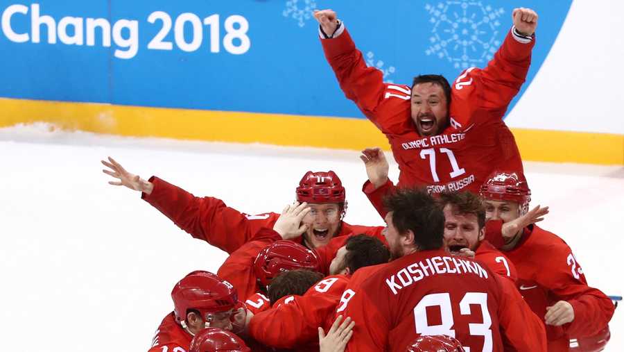 The Olympic Athletes from Russia celebrate their victory in the men's gold medal ice hockey game against Germany at Gangneung Hockey Centre at the 2018 Winter Olympic Games. 