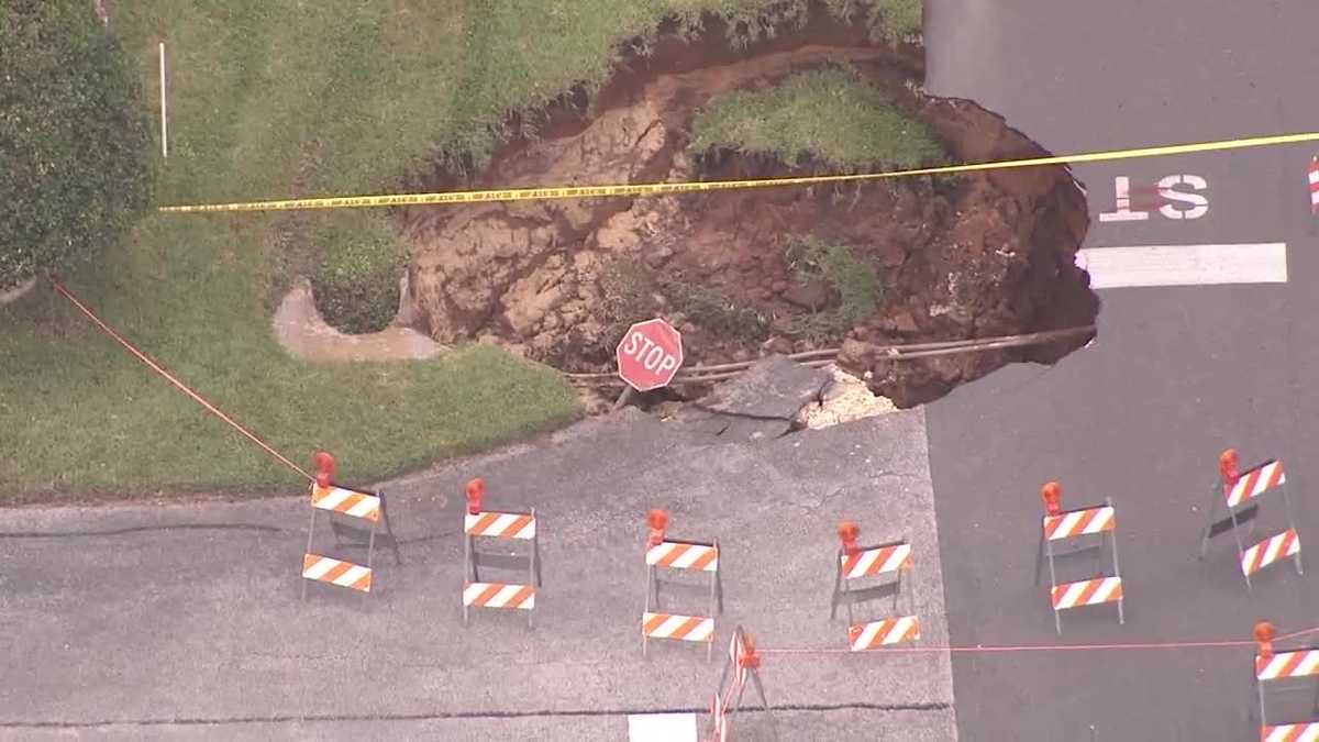 Large sinkhole swallows portion of road in Ocala