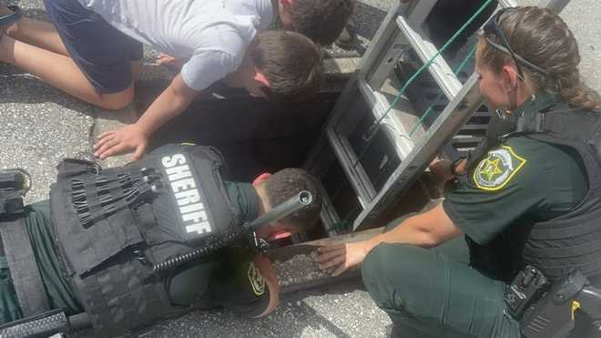 Deputies rescue ducklings trapped in storm drain at Waterford Lakes ...