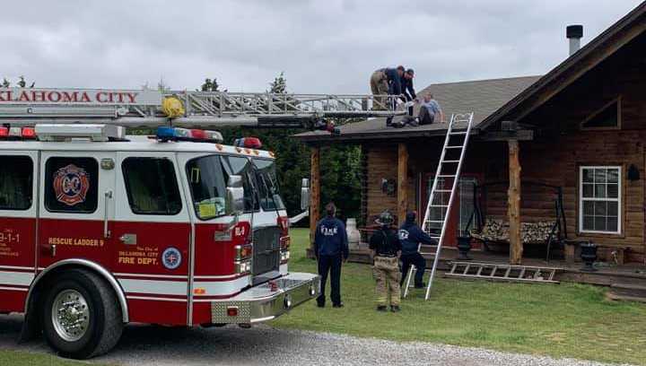 A man who was repairing a leak on his roof had to be helped down by Oklahoma City firefighters using a rescue ladder.