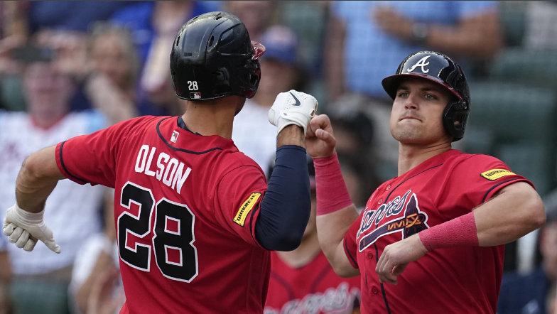Matt Olson of the Atlanta Braves hits a RBI single in the first