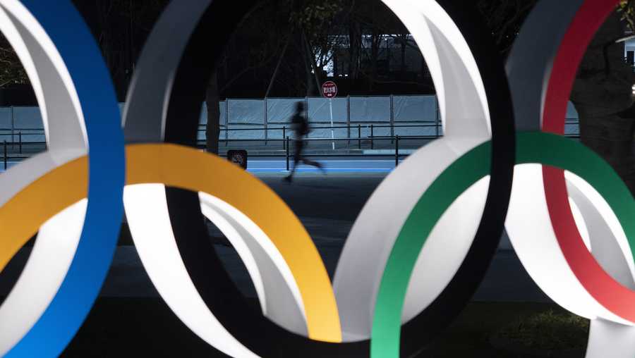 FILE - In a  message delivered to IOC members, Friday, July 17, 2020, online, Tokyo organizing committee President Yoshiro Mori and CEO Toshiro Muto announced the competition schedule for next year's delayed Tokyo Olympics will remain almost identical to the one that would have been used this year.