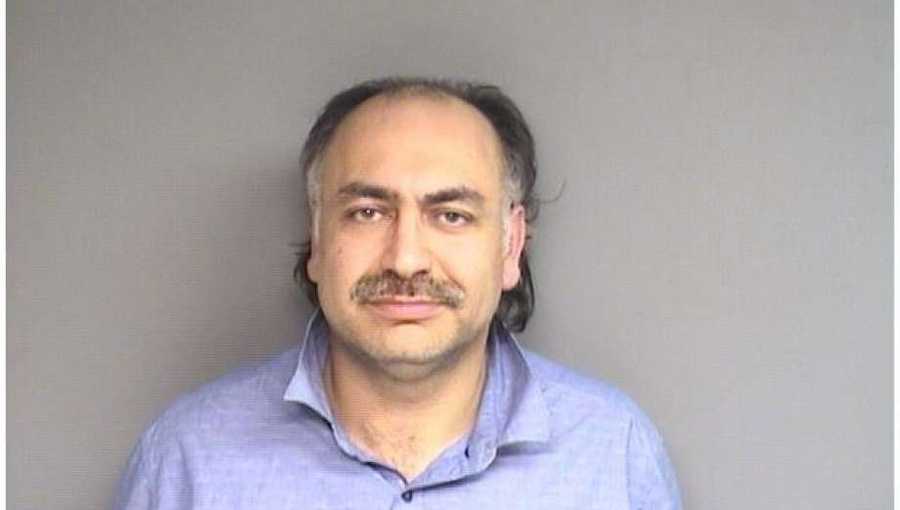 Omer Ekinci, 42, of Stamford, is accused of choking his live-in babysitter.