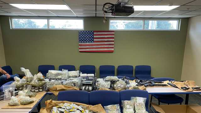 Police: Cannabis, meth, cash, guns seized from apartment building - Vimarsana News