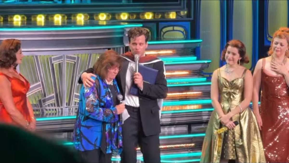 Teacher Sue Fisher honors Broadway star Jonathan Groff with F&M doctorate on stage