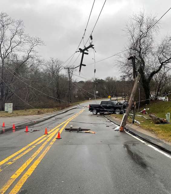 Busy Cape Cod road shut down after crash rips down utility lines