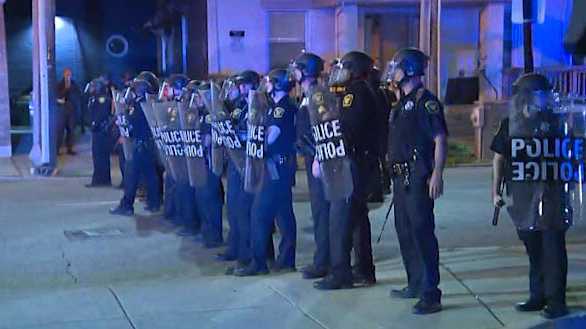 Police: Officer struck by bullet while dispersing crowds in Clifton