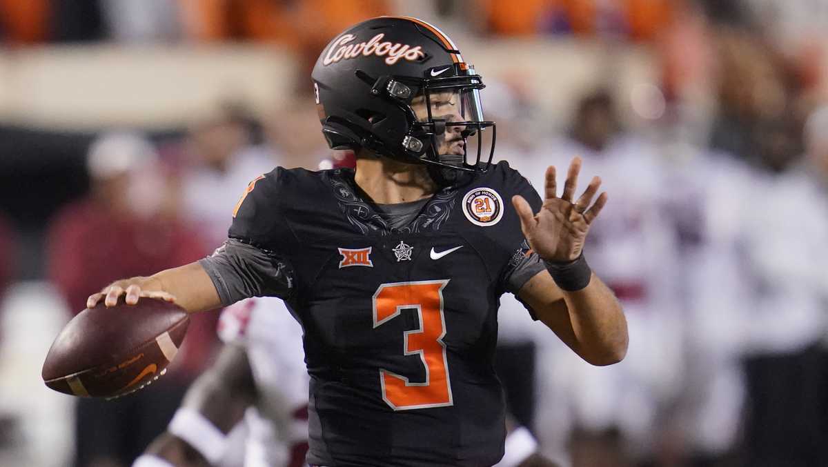 sanders leads no 7 oklahoma state past no 10 oklahoma
