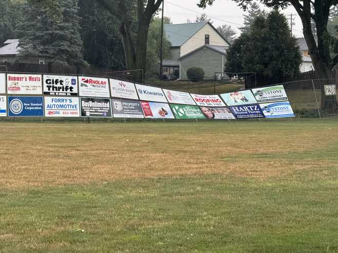 The outfield fence at Kunkle Field in Mt Joy was blown down before the start of the 12U LNP game between Hempfield and Penn Manor.