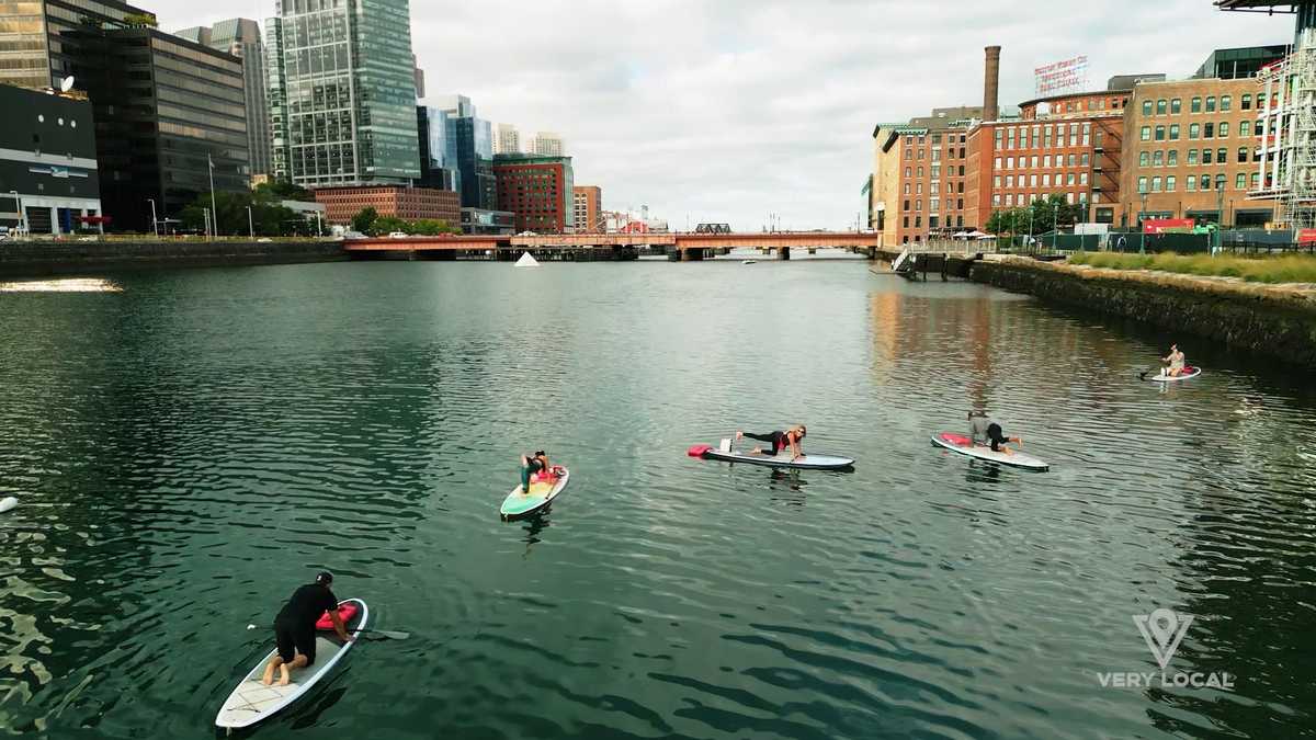 Yoga on Boston Harbor Paddle board adds challenge, great view