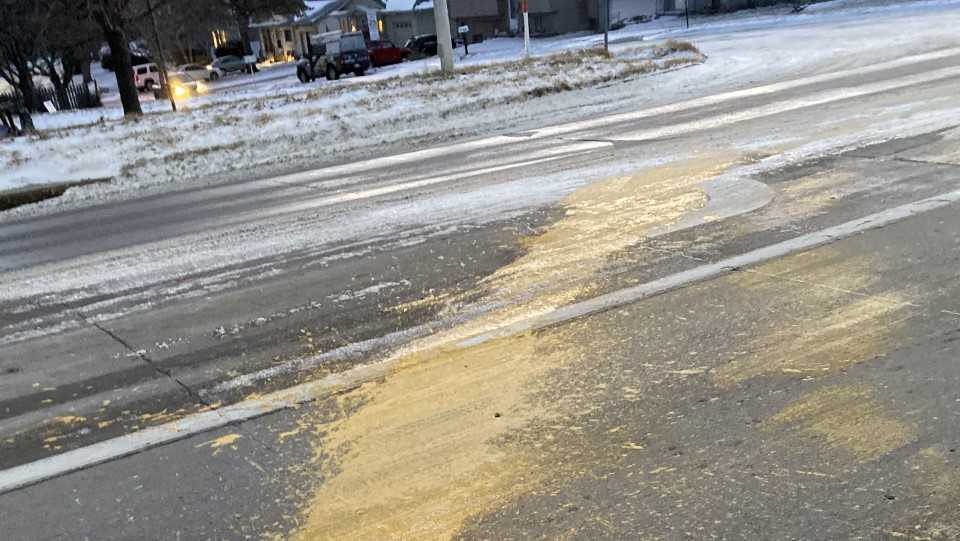 Spilled paint on an Omaha road is costing the city and drivers