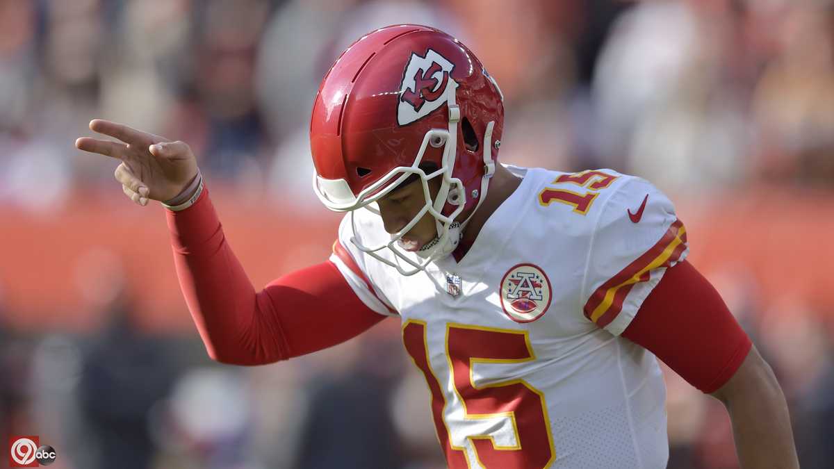 Kansas City Chiefs quarterback Patrick Mahomes (15) celebrates with tight  end Travis Kelce (87) after throwing a 67-yard touchdown pass to Tyreek  Hill during the first quarter of an NFL football game