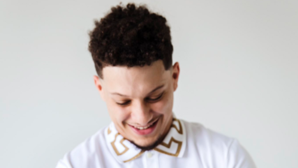 Patrick Mahomes Gazes At Baby Sterling In 1-Month Photo 