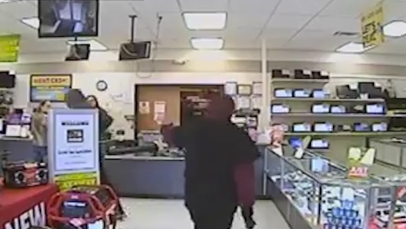 Police Release Surveillance Video Taken During Armed Robbery At Pawn Shop