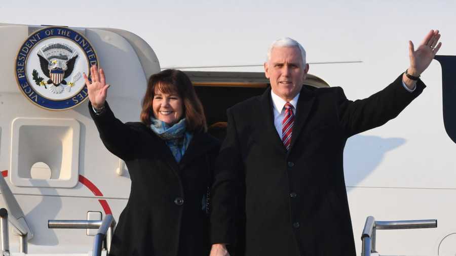 U.S. Vice President Mike Pence (R) and his wife Karen Pence wave upon arriving at the Osan Air Base on February 8, 2018 in Pyeongtaek, South Korea. Vice President Pence is visiting South Korea to lead the U.S. delegation in the opening ceremony of PyeongChang Winter Olympic Games. 