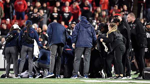virginia-s-perris-jones-regains-movement-after-hit-during-louisville-game