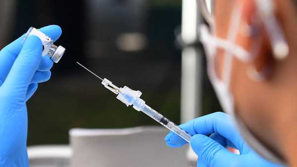 The Pfizer COVID-19 vaccine is prepared for administration at a vaccination clinic for homeless people, hosted by the Los Angeles County Department of Public Health and United Way on September 22, 2021 in Los Angeles, California.