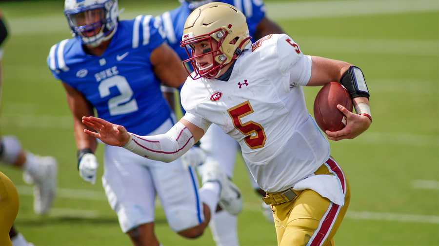 Boston College quarterback Phil Jurkovec (5) runs for a first down against Duke during the second half of an NCAA college football game, Saturday, Sept. 19, 2020, in Durham, N.C. (Nell Redmond/Pool Photo via AP)