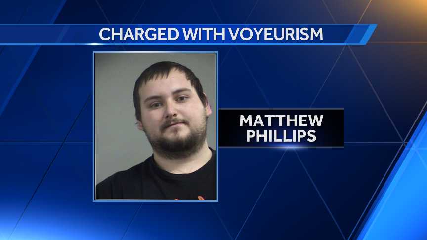 Man charged with voyeurism after taking pictures of sleeping woman