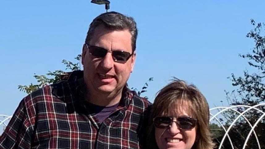 Cincinnati couple shot at a Denver Company Rental Car or truck