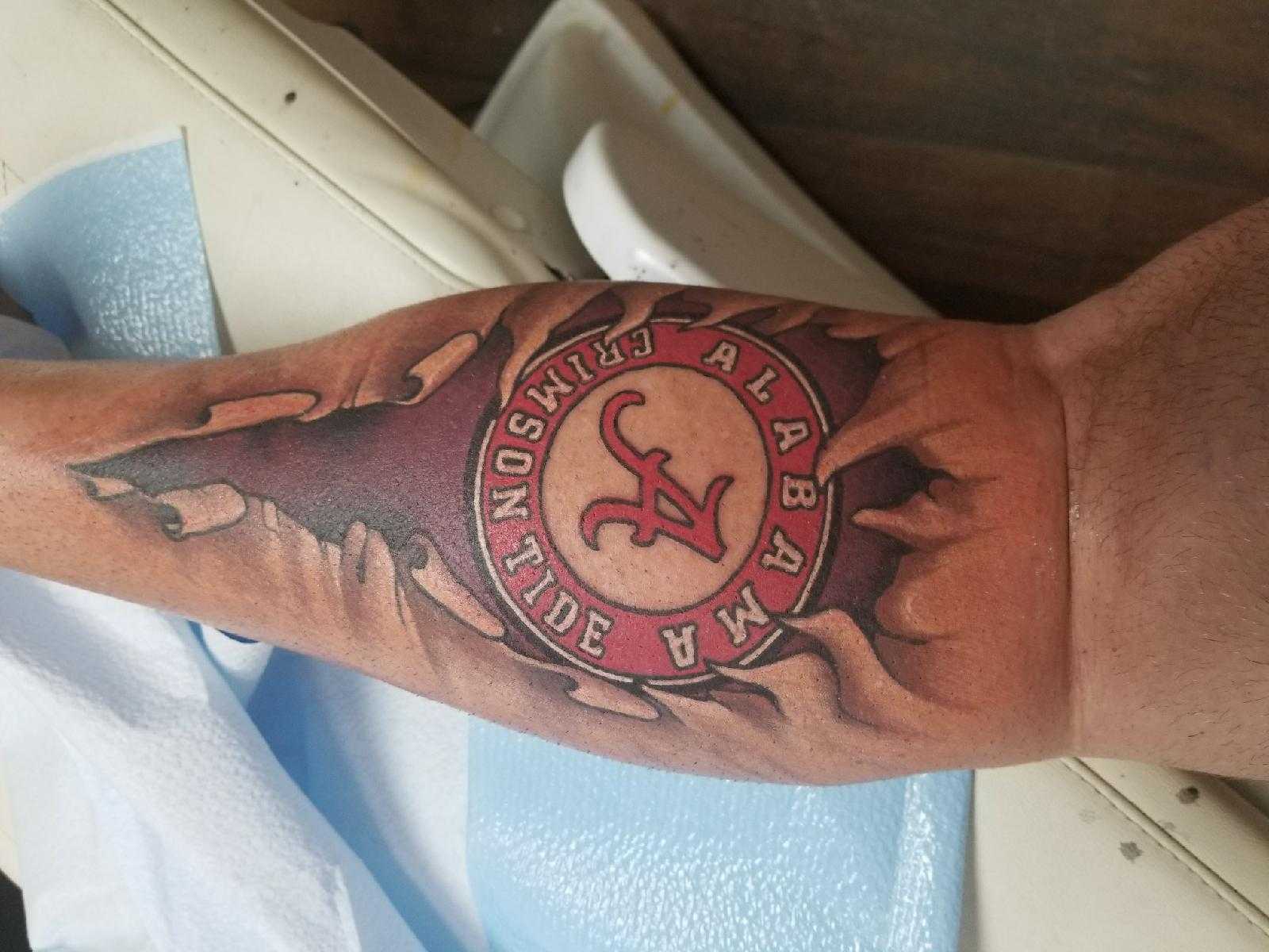 He Bleeds Crimson Alabama fan gets crazy calf tattoo photos