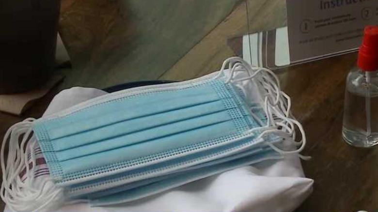 Photo shows stack of surgical masks