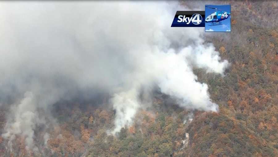 Firefighters worked to slow growth of Pinnacle Mountain fire through the day Tuesday