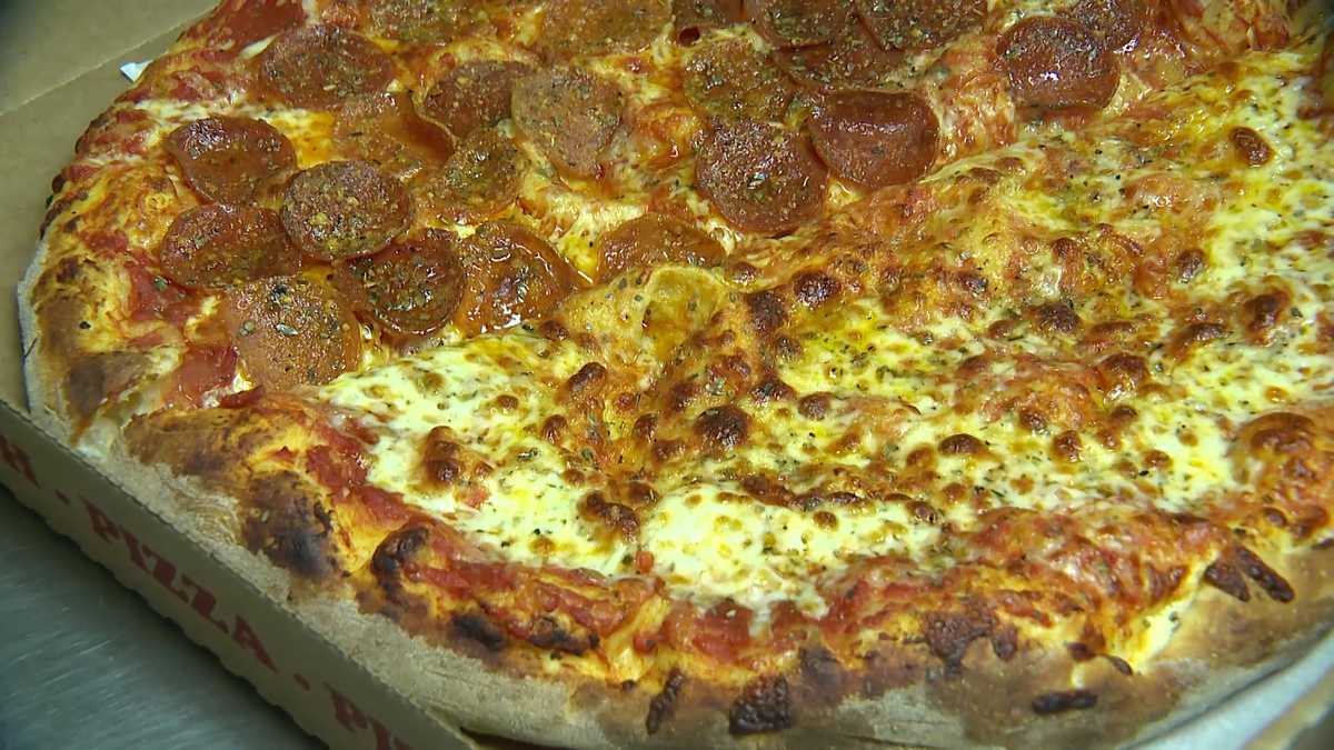 Maine restaurant gives out free pizza to lift community's spirits