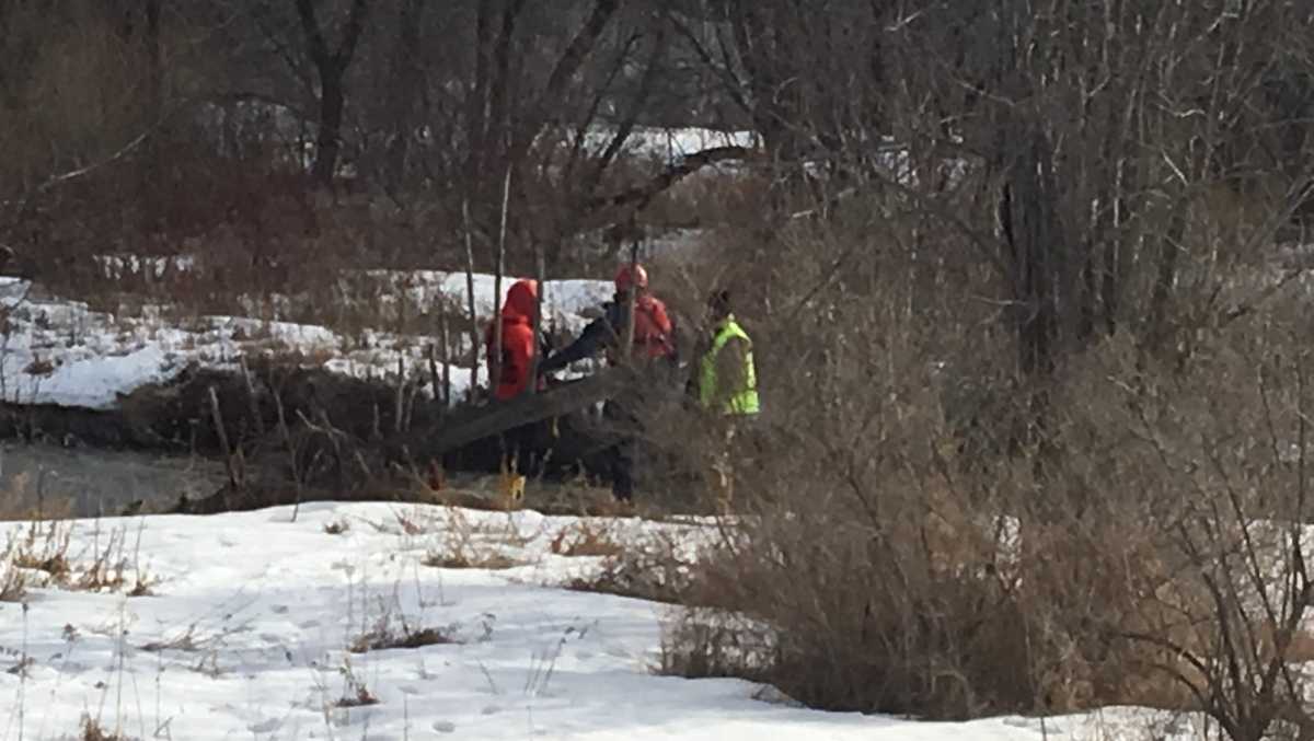 Police search river for missing passenger after crash