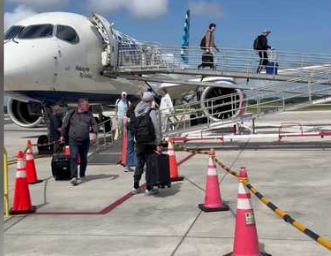 passengers depart jetblue flight in vero beach
