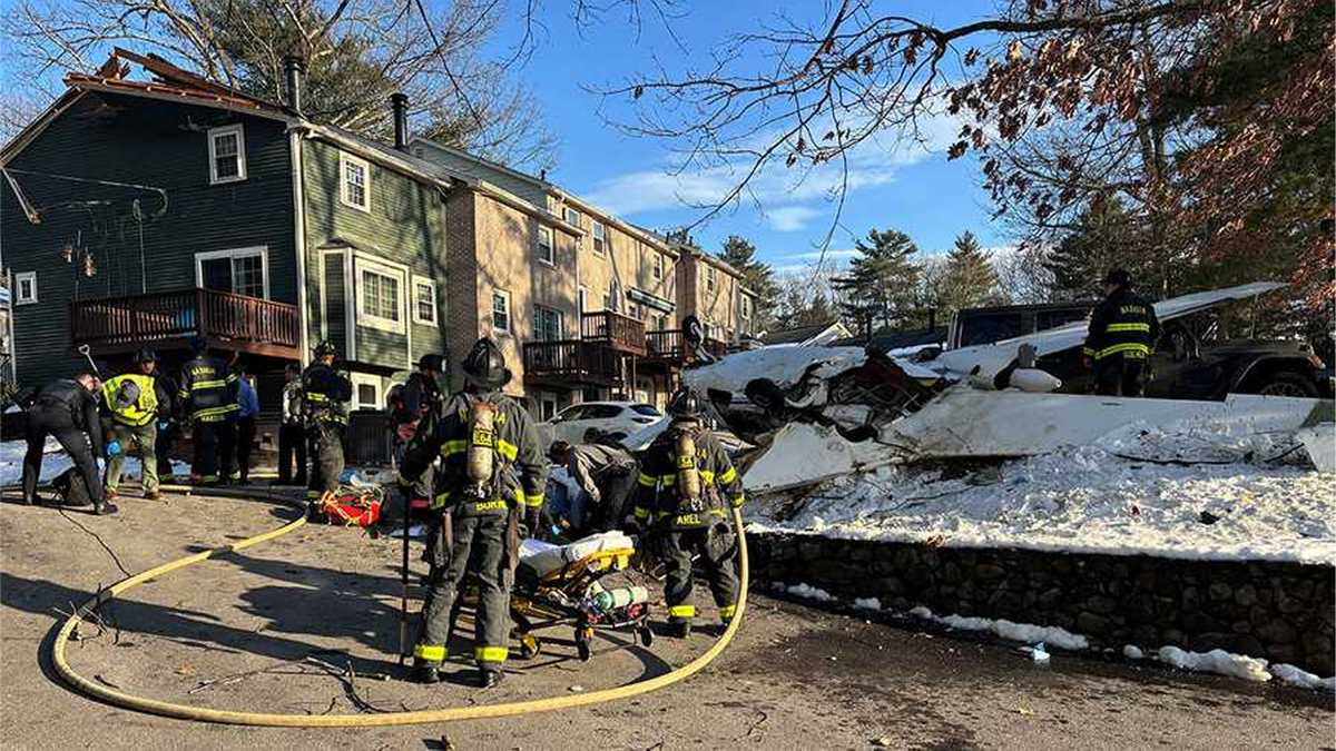 Plane clips roof of NH home, crashes at residential complex
