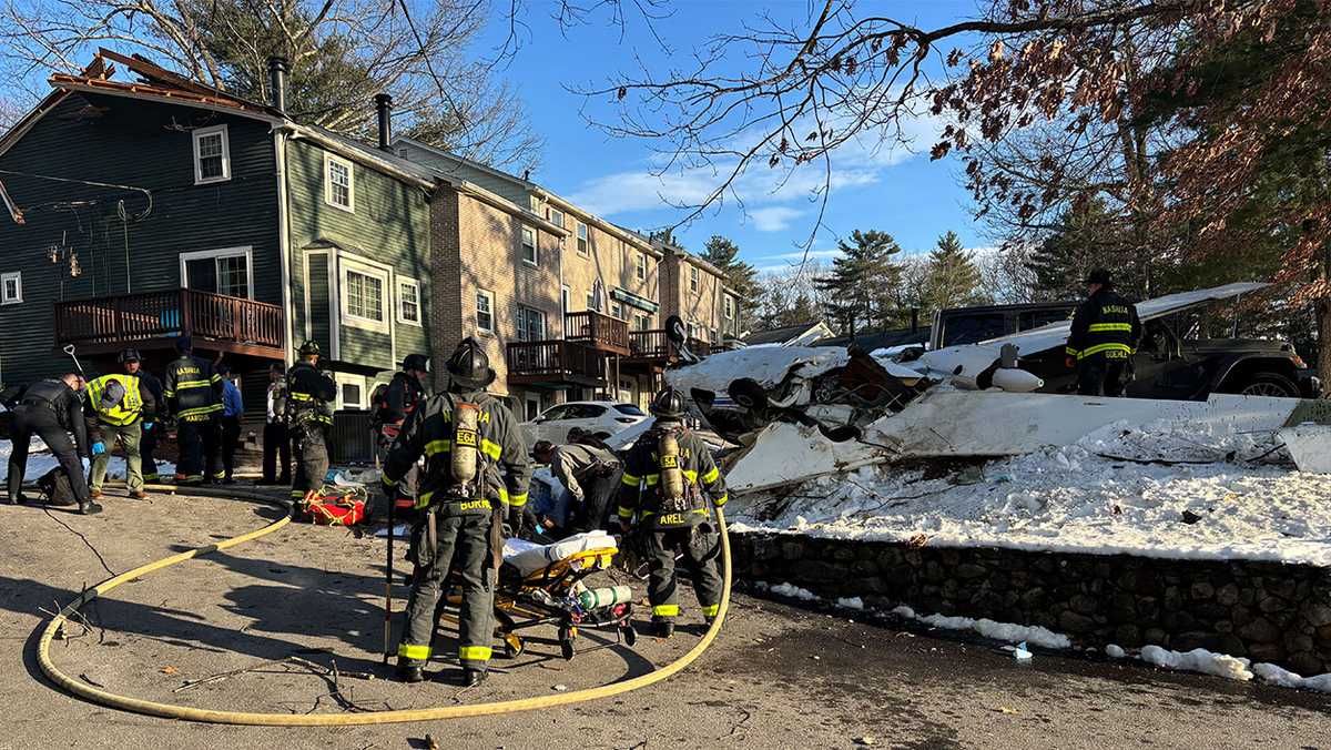 Plane clips roof and crashes in New Hampshire neighborhood; residents rush to help injured pilot