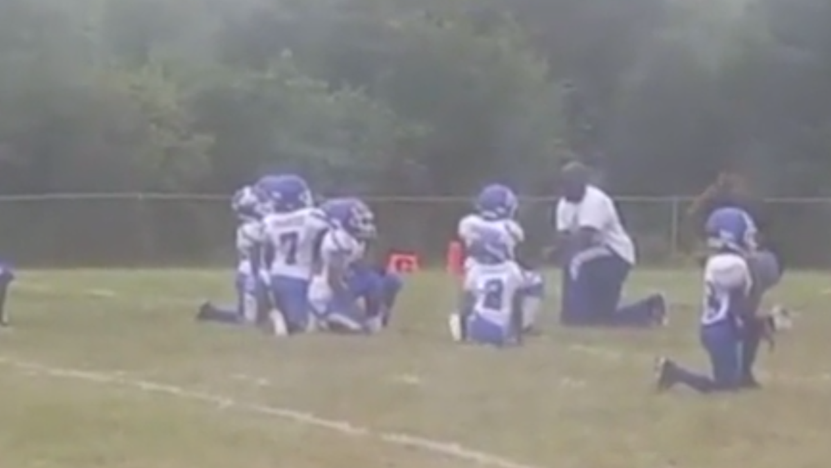 8 Year Old Football Players Kneel During National Anthem 8326