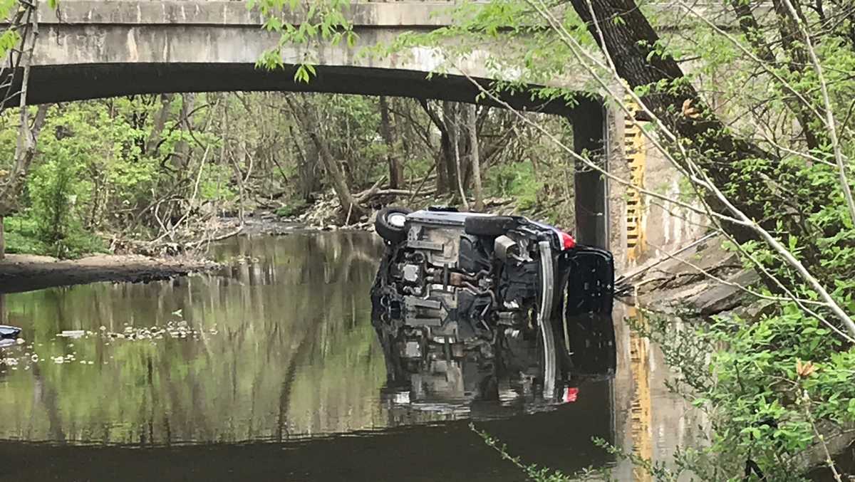 Baltimore patrol car involved in crash falls into Herring Run