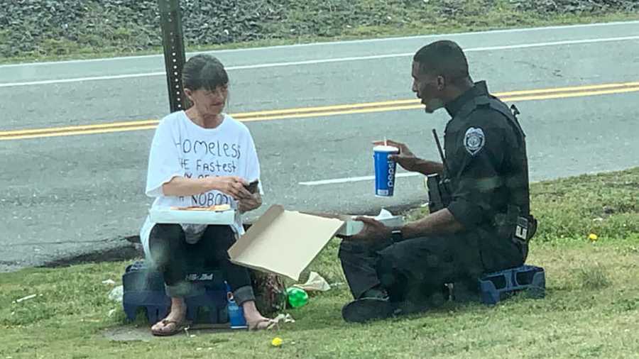 Officer Michael Rivers spent his lunch break sharing pizza with a homeless woman.