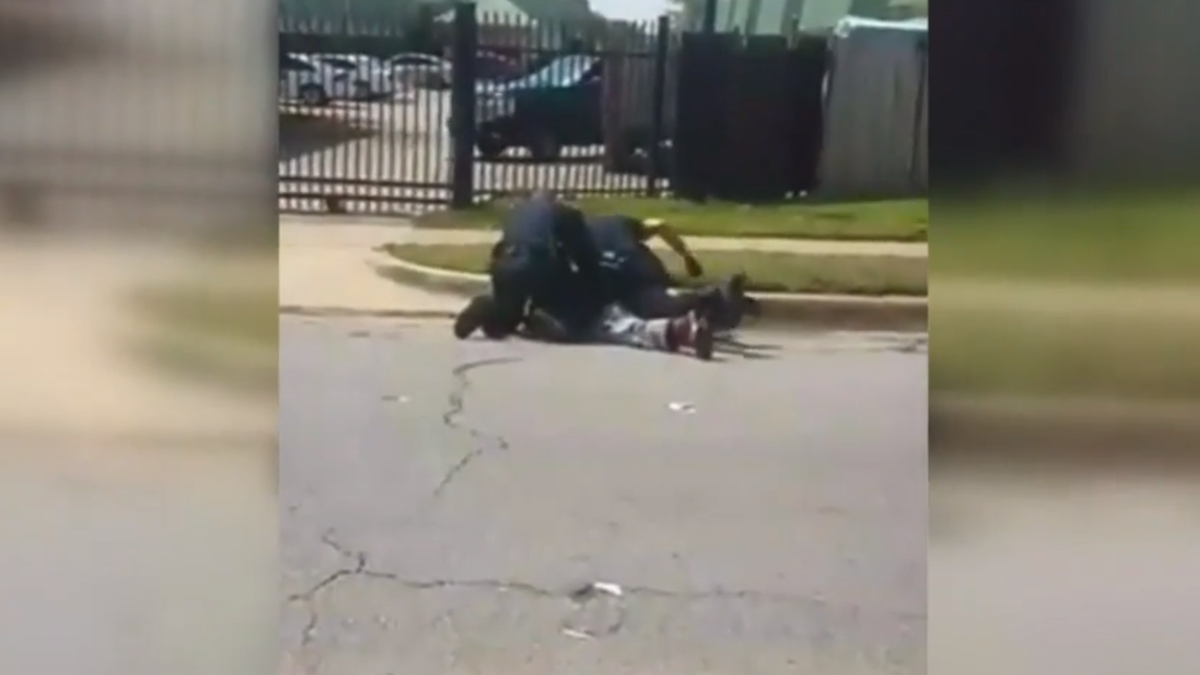 Video Shows Police Repeatedly Punching Man Pinned To Street As He Cries Why