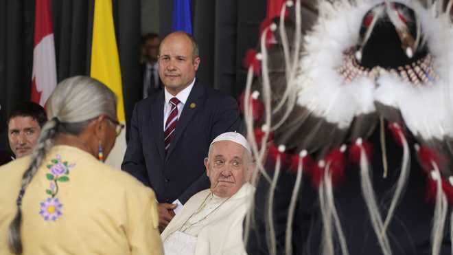 Pope&#x20;Francis&#x20;meets&#x20;the&#x20;Canadian&#x20;Indigenous&#x20;people&#x20;as&#x20;he&#x20;arrives&#x20;at&#x20;Edmonton&#x27;s&#x20;International&#x20;airport,&#x20;Canada,&#x20;Sunday,&#x20;July&#x20;24,&#x20;2022.&#x20;Pope&#x20;Francis&#x20;begins&#x20;a&#x20;weeklong&#x20;trip&#x20;to&#x20;Canada&#x20;on&#x20;Sunday&#x20;to&#x20;apologize&#x20;to&#x20;Indigenous&#x20;peoples&#x20;for&#x20;the&#x20;abuses&#x20;committed&#x20;by&#x20;Catholic&#x20;missionaries&#x20;in&#x20;the&#x20;country&#x27;s&#x20;notorious&#x20;residential&#x20;schools.