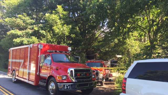 Coroner identifies woman who died while trapped in burning home