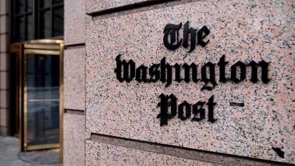 A sign for the Washington Post is seen at the company's offices, Monday, Jan. 26, 2026, in Washington.