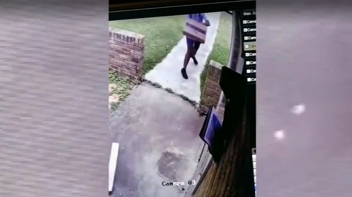 Woman catches postal worker throwing packages at her front door