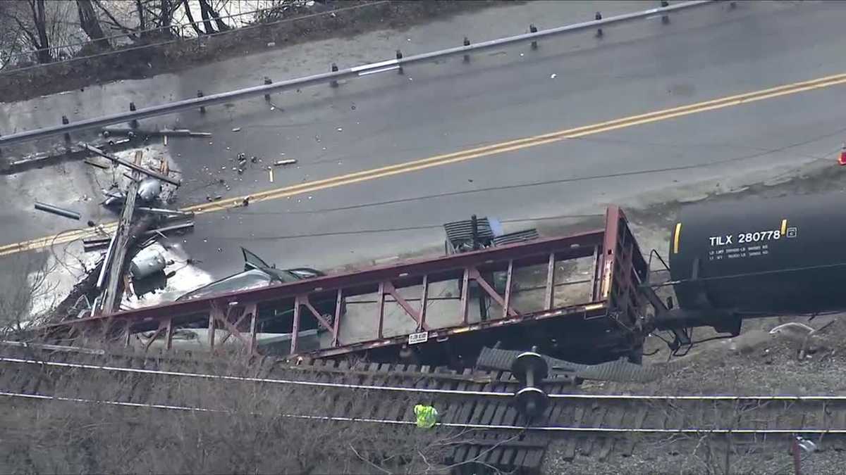 Photos: Freight train derails on bridge in north Baltimore