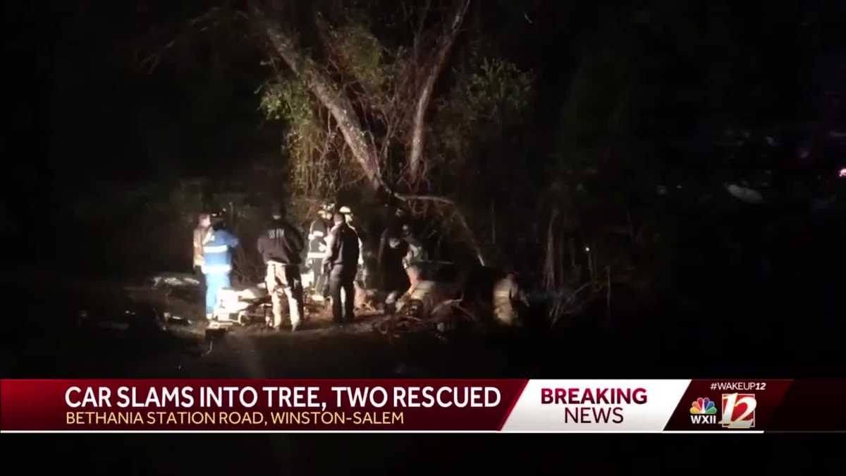 2 trapped in wreckage after car slams into tree in Winston-Salem