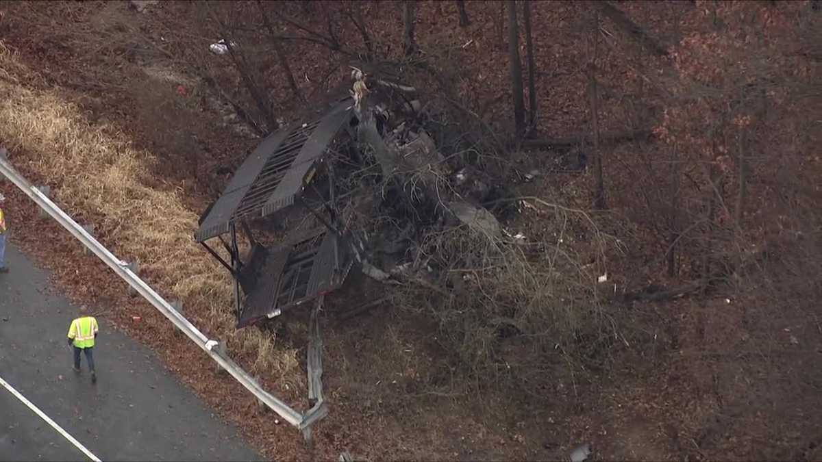 Person critical after tractor trailer, car carrier crash on I-83