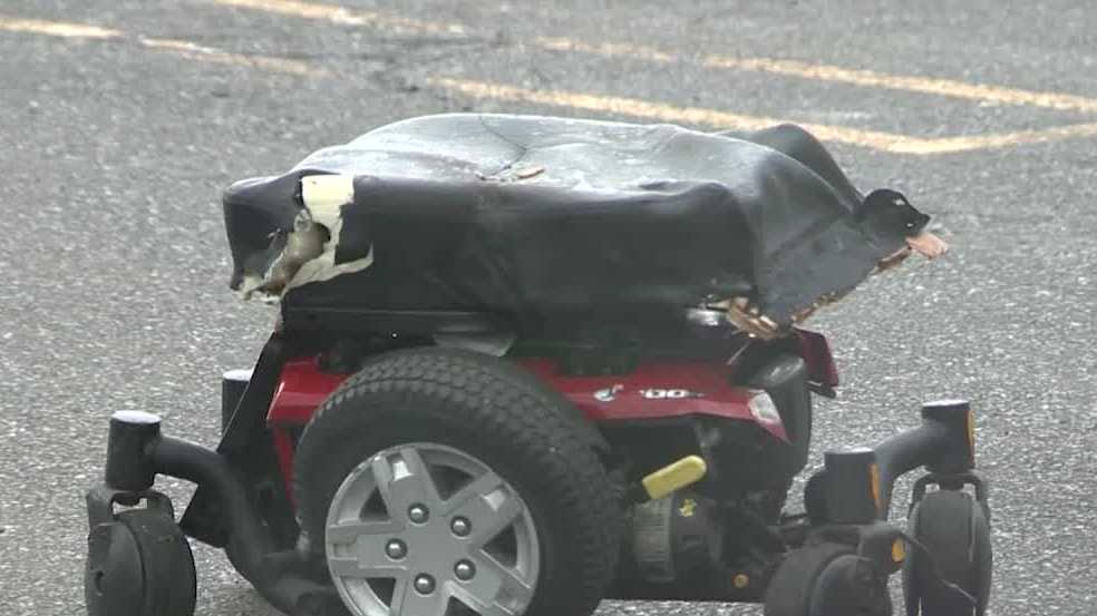 Woman in motorized wheelchair hit by truck