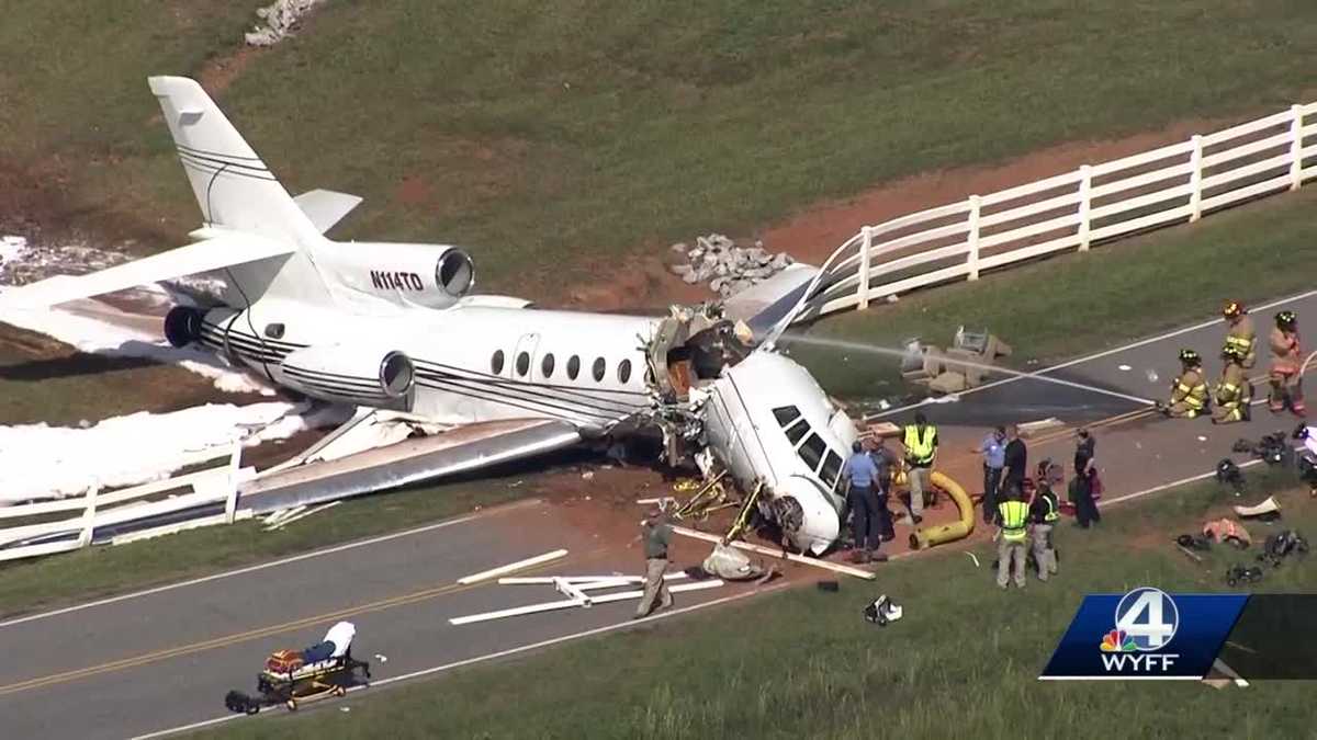 2 killed when small jet crashes onto road at Downtown Airport, breaks