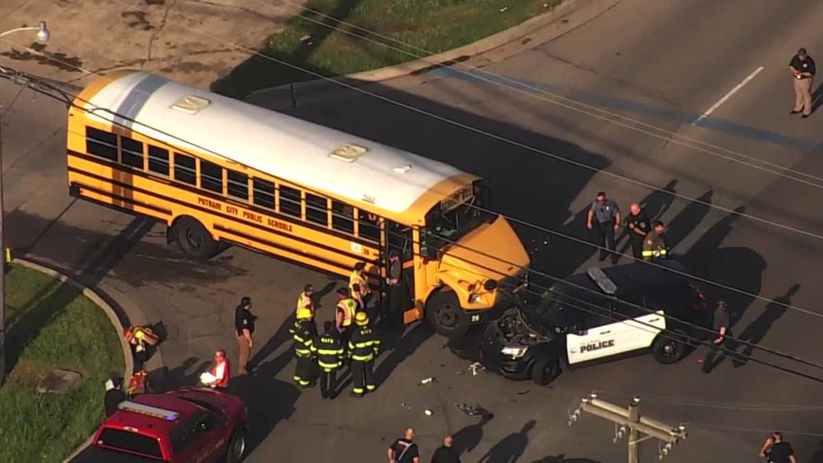 Injuries reported in crash involving school bus, police car near Bethany