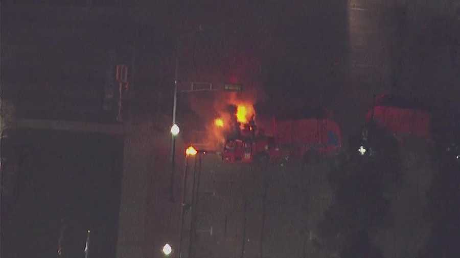 An image from News Chopper 12 shows a burning garbage truck in Kenosha