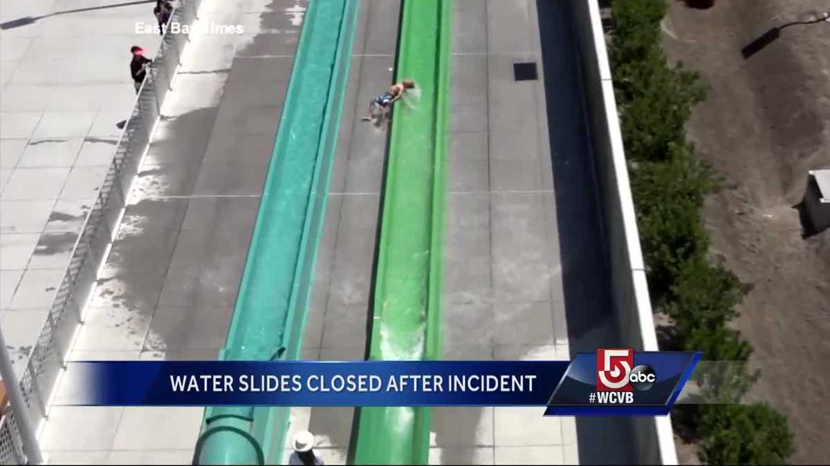 Boy flies off water slide